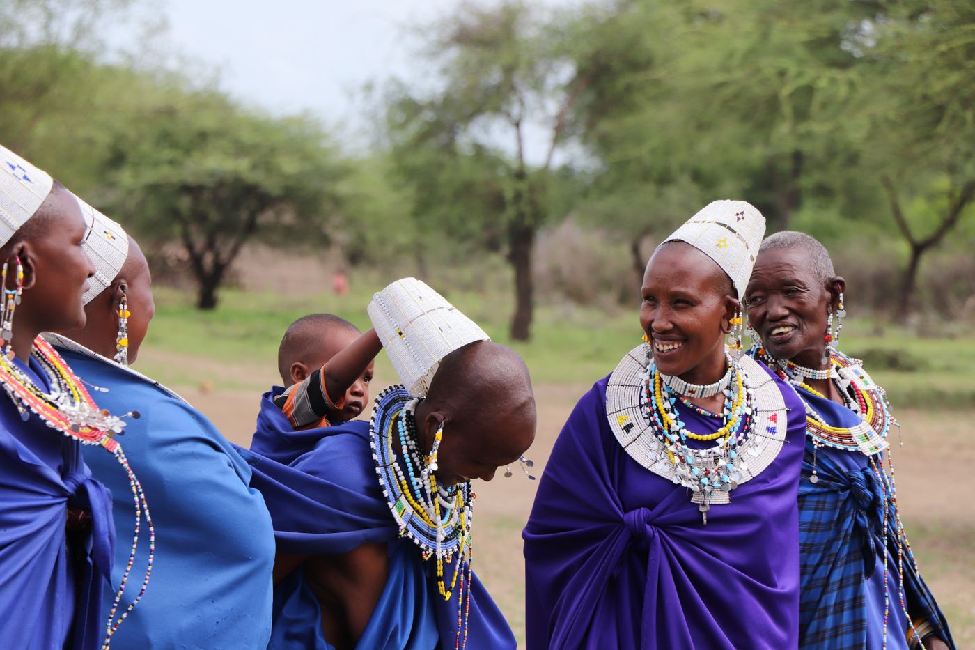 Maasai women and child in traditional attire Tanzania