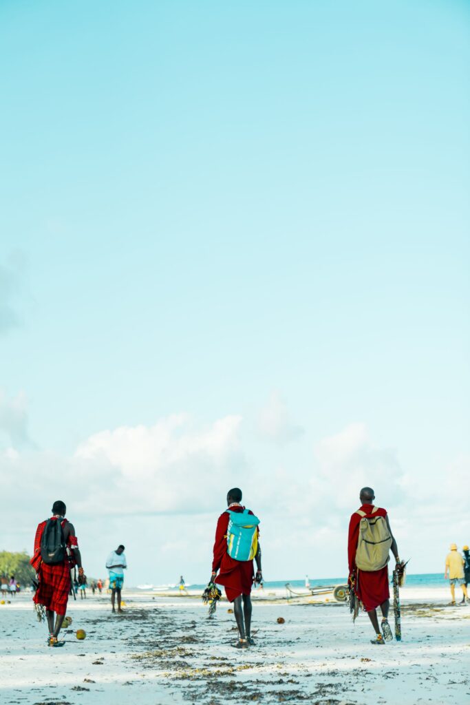 Traditional attire stroll along Diani Beach, Kenya